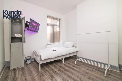Ένα ή περισσότερα κρεβάτια σε δωμάτιο στο Kunda House O Grange Bunk Rooms MEN ONLY