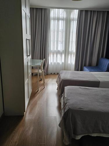 Katil atau katil-katil dalam bilik di Hotel Mariquito
