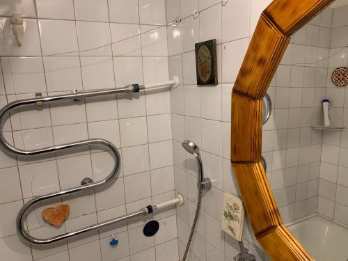 a bathroom with a shower with a tub and a shower at Jalaka, Nice 2-bedroom apartment - 1 big bed - 2 single bed in Tartu