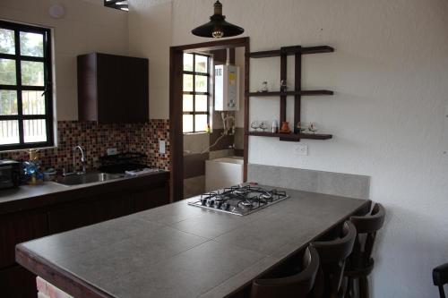 Una cocina o zona de cocina en Mi terrunio-Alojamiento rural