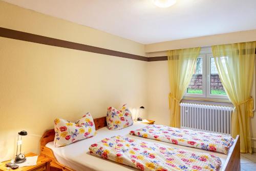 Katil atau katil-katil dalam bilik di An den Weinbergen
