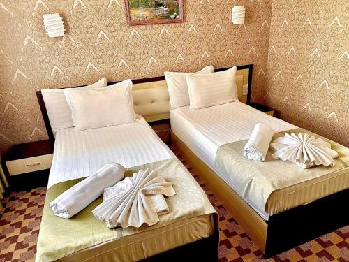 Katil atau katil-katil dalam bilik di Sofiya Tashkent Hotel