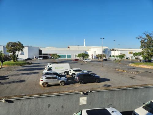 a group of cars parked in a parking lot at ibis Montes Claros Shopping in Montes Claros