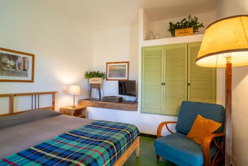 Ένα ή περισσότερα κρεβάτια σε δωμάτιο στο Agriturismo Il Monticello