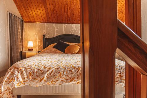 Postel nebo postele na pokoji v ubytování Maison place de la Pieta
