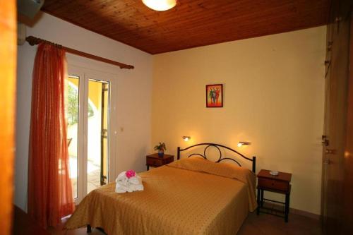 En eller flere senge i et værelse på Apartment Alex 3, Barbati