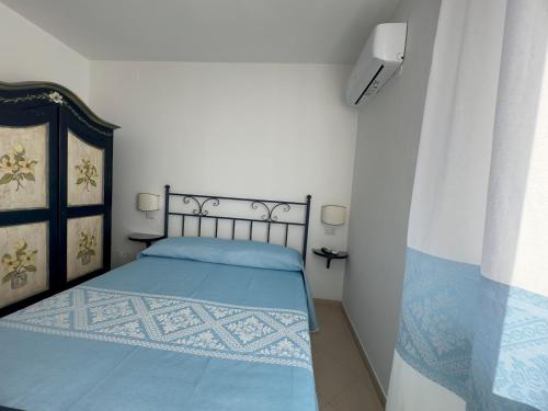 Postel nebo postele na pokoji v ubytování Garden Hotel Alghero