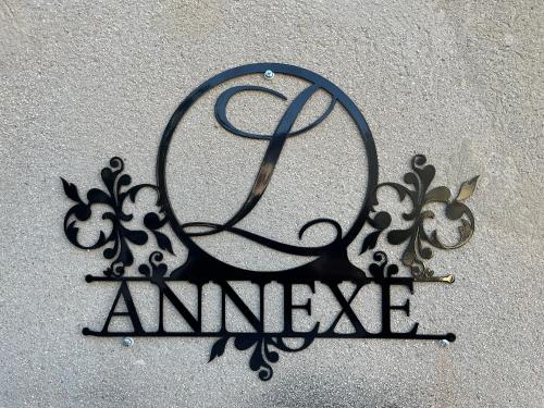 a sign that says amnesia with a symbol on it at Auberge Sainte Marguerite in La Garde