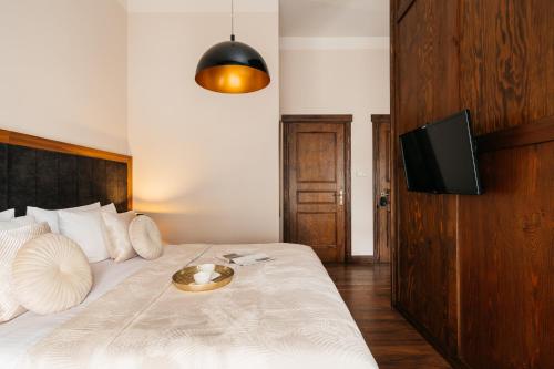 Ένα ή περισσότερα κρεβάτια σε δωμάτιο στο Topolowa Residence - LoftAffair Collection