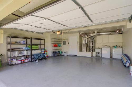 an empty garage with refrigerators and machines in it at Ocean Oasis in Encinitas