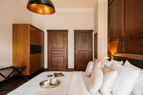 Ένα ή περισσότερα κρεβάτια σε δωμάτιο στο Topolowa Residence - LoftAffair Collection