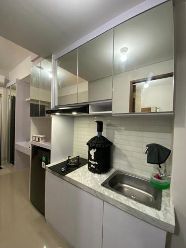 Photo de la galerie de l'établissement APARTEMENT TRANSPAK JUANDA By Enjoy Room, à Rawabugel