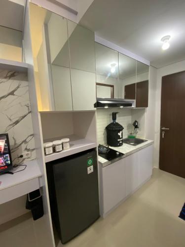 Photo de la galerie de l'établissement APARTEMENT TRANSPAK JUANDA By Enjoy Room, à Rawabugel