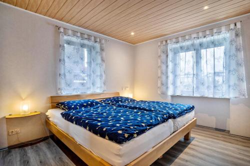 Ένα ή περισσότερα κρεβάτια σε δωμάτιο στο Haus Monterosa