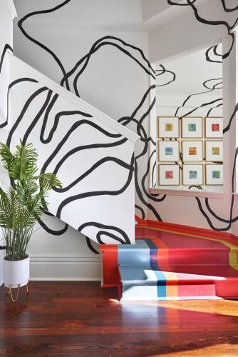 a room with a mural on the wall at Large historical home w/ fire pit, chef kitchen. in Memphis