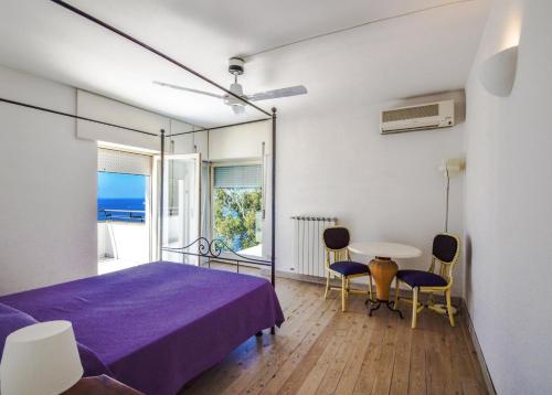 Ένα ή περισσότερα κρεβάτια σε δωμάτιο στο AMORE RENTALS - Villa Terri