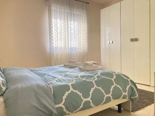 Postel nebo postele na pokoji v ubytování Nonna Rosa (10 min to Pompei)