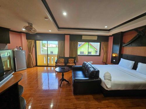 Cama o camas de una habitación en Nanai 2 Residence Patong Phuket