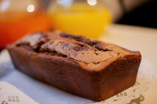 a piece of chocolate cake sitting on a table at Hotel Touring in Ferrara