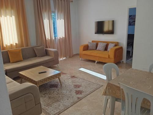 Posezení v ubytování Bel appartement proche de la mer Hammamet