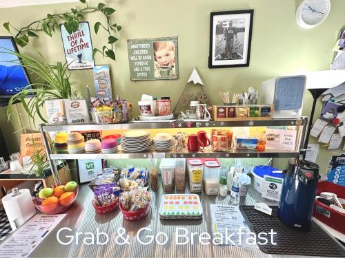 a counter with food and other items on it at Snowdon Chalet Motel in Londonderry
