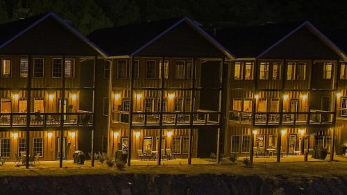 a large building at night with lights on at Keweenaw Waters Resort in Houghton