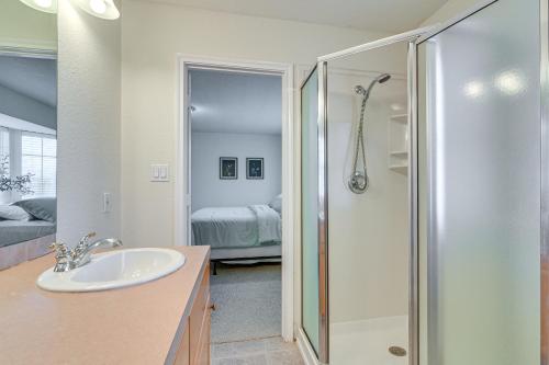 a bathroom with a sink and a shower at Downtown Kemah Rental about 3 Blocks to Boardwalk! in Kemah