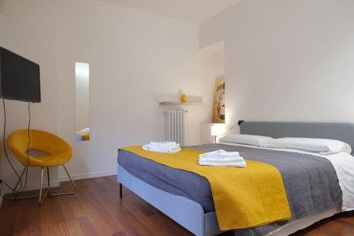 En eller flere senge i et værelse på Case VR Holiday - VG12