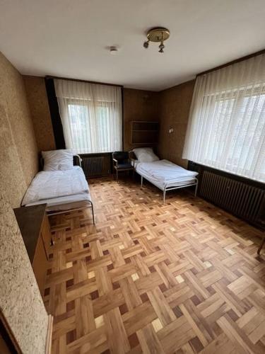 Katil atau katil-katil dalam bilik di Monteurwohnung Wächtersbach