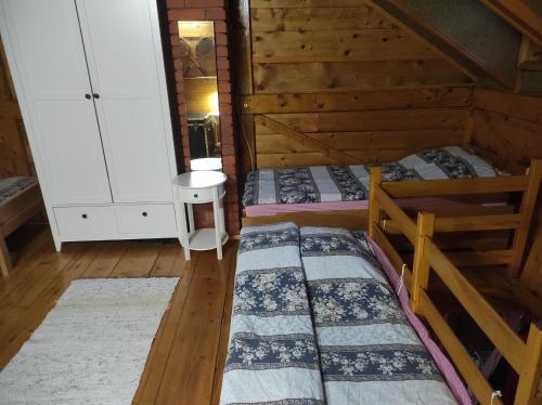 Ένα ή περισσότερα κρεβάτια σε δωμάτιο στο Vikendica Darija