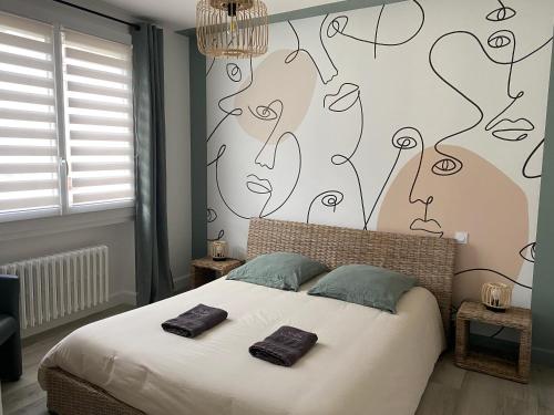 Ένα ή περισσότερα κρεβάτια σε δωμάτιο στο Chambres d'hôtes Villa Volcano