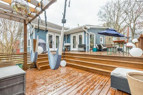 a porch with a hammock on a house at Historic East Nash Sleeps 6 in Nashville