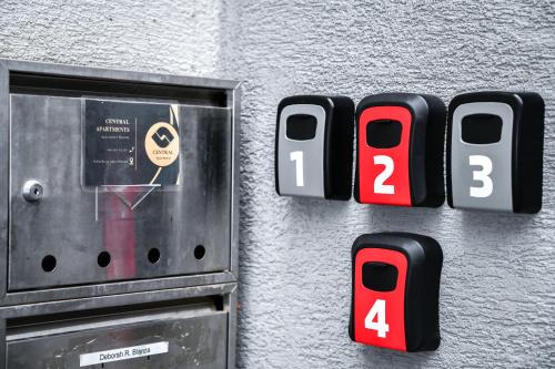 a close up of an electronic device on a wall at Central Apartments in Martin