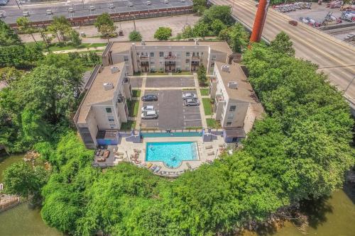 an overhead view of a mansion with a swimming pool at Walk to Broadway Riverfront Condo with Pool in Nashville