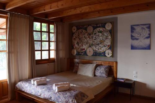 Giường trong phòng chung tại Κτήμα Φτελιά