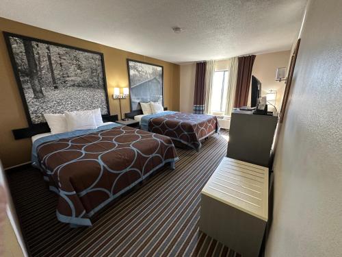 Ein Bett oder Betten in einem Zimmer der Unterkunft Super 8 by Wyndham Columbia Clark Lane
