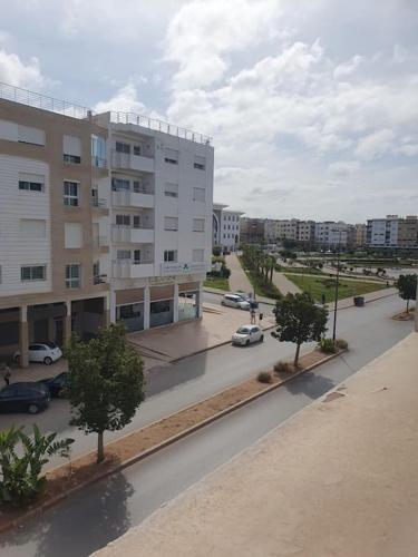 a view of a city street with a building at Appartement spacieux, exceptionnel in Temara
