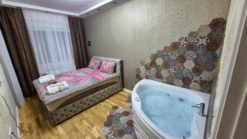 Una cama o camas en una habitación de PLAY APARTMAN VRSAC