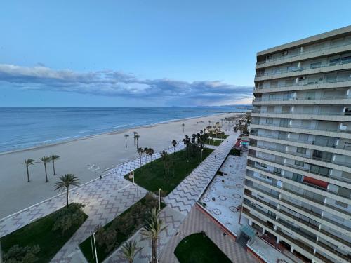 a view of the beach from the balcony of a building at Apto. Cullera vistas espectaculares primera línea in Cullera