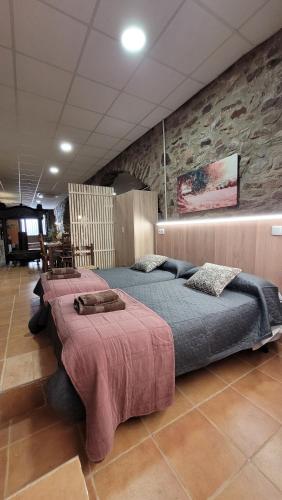 Postel nebo postele na pokoji v ubytování Casa Rural La Almazara