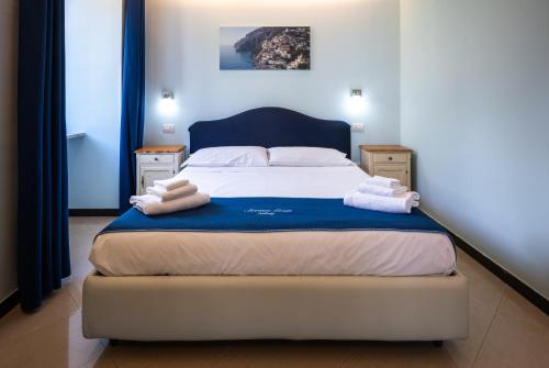 Ένα ή περισσότερα κρεβάτια σε δωμάτιο στο Sorrento Coast Relais