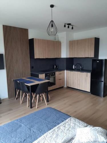 Kuchyňa alebo kuchynka v ubytovaní Apartament Przy Plaży Gdańsk