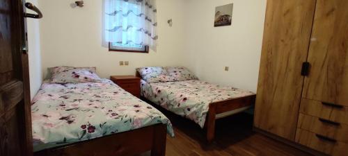 Postel nebo postele na pokoji v ubytování Domki Nad Tanwią