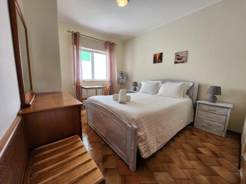 Postel nebo postele na pokoji v ubytování Casa do Sol Algarve