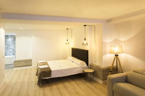 Posteľ alebo postele v izbe v ubytovaní Egona -Apartamentos Itxaropena Zarautz