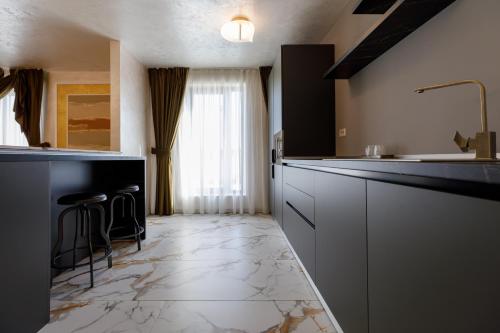 Η κουζίνα ή μικρή κουζίνα στο RIVER PLACE