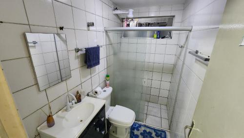 a small bathroom with a sink and a toilet at Hostel Hay's 1 Aeroporto Boa Viagem in Recife