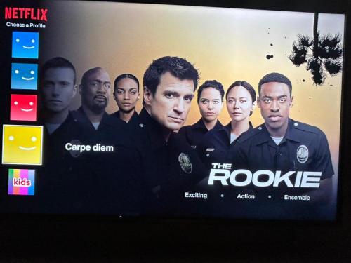 a poster of the rooke team on a television screen at Luxury suite in Ben Slimane