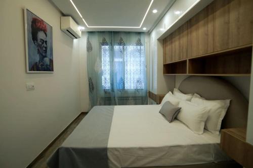 Ένα ή περισσότερα κρεβάτια σε δωμάτιο στο La cozy suite