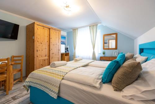 A bed or beds in a room at Balaton Fantasy Villa